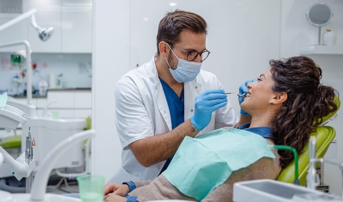 General dental consultation at Magna Dental Clinic — dentist examining patient